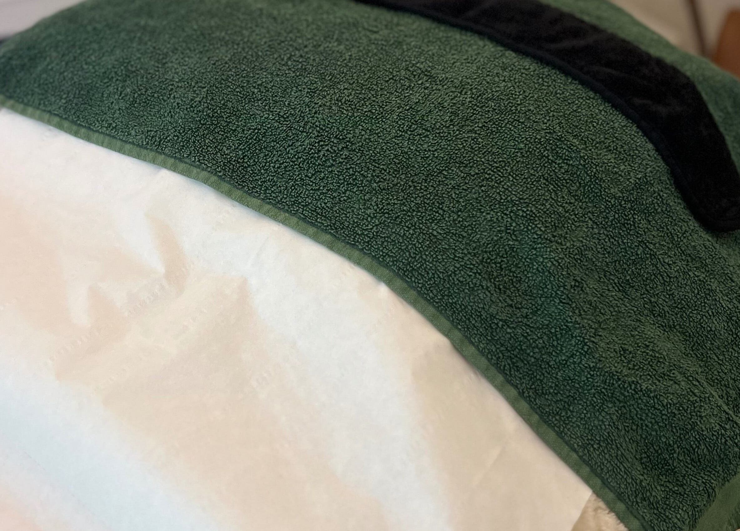 Green towel set on treatment table at Acupuncture with Natalie, Lowestoft, England, GB.