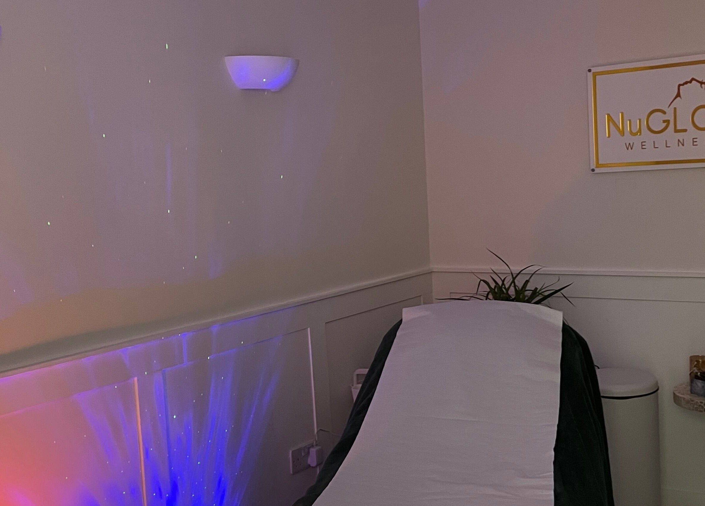 Relaxing treatment room at Acupuncture with Natalie, Lowestoft, England, GB with calming lighting.