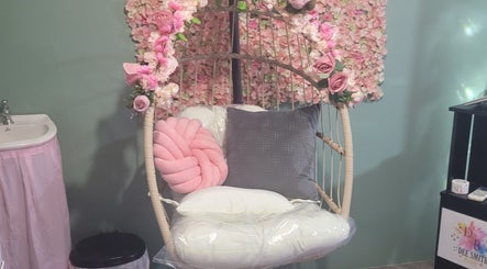 Floral swing chair in serene setup at Dee Smith Beauty Experts, Couva, Couva-tabaquite-talparo Regional Corporation, TT.