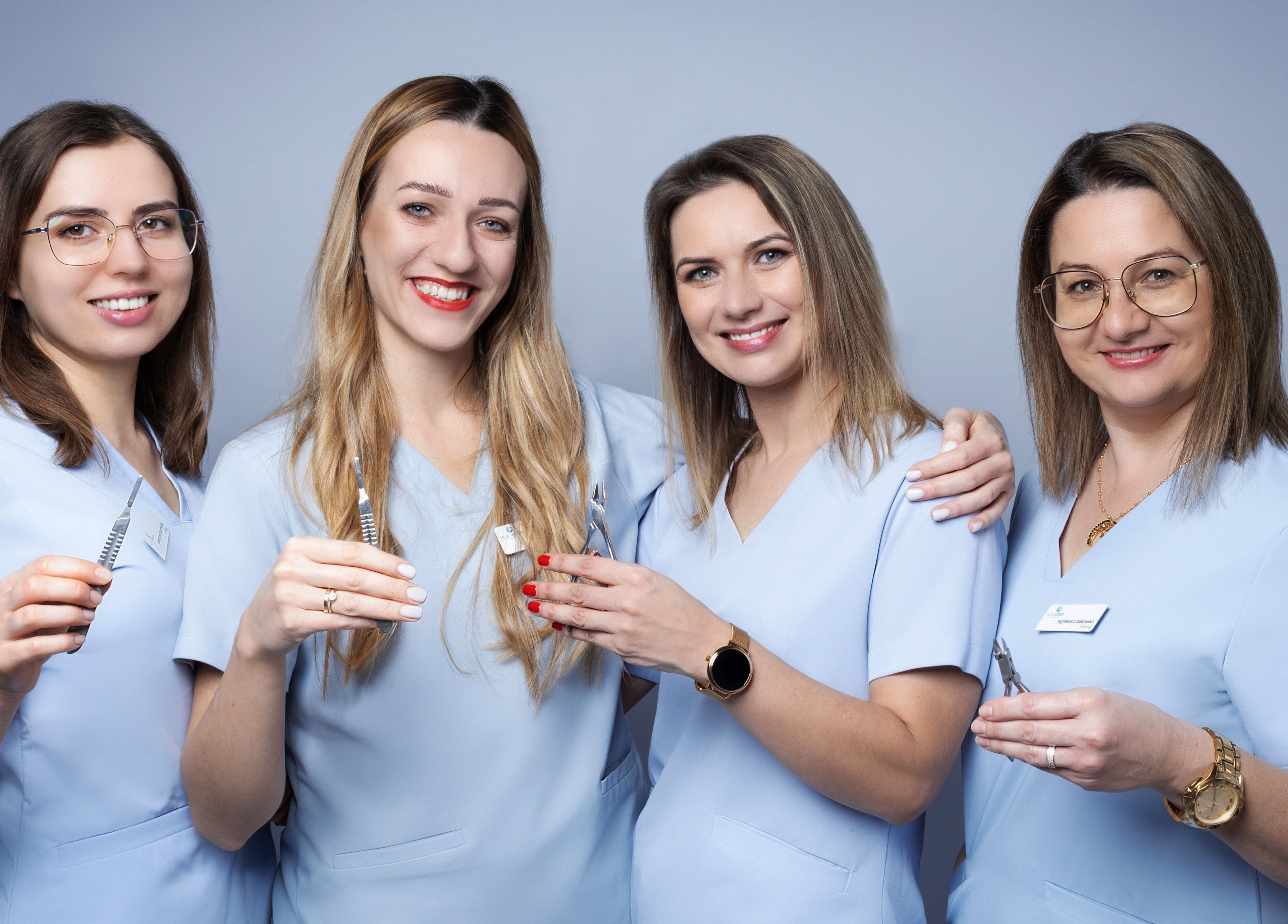 Zespół specjalistów w Medic 4 Foot Profesjonalnie Dla Stóp w Łódź, Łódzkie, PL, w strojach medycznych.