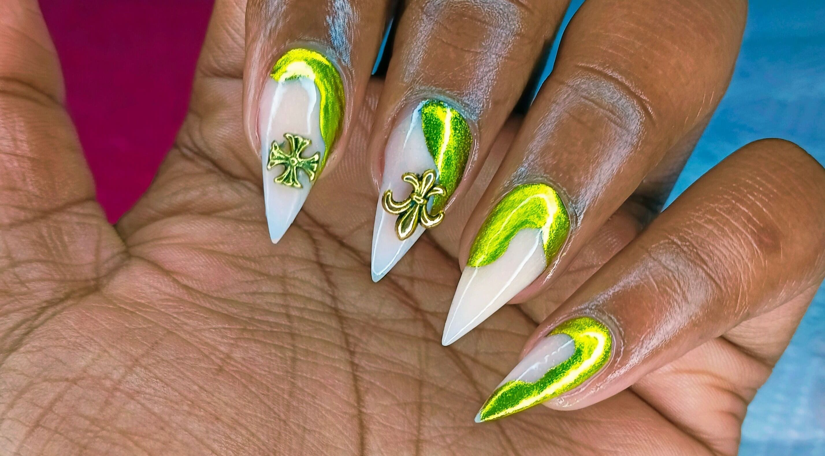 Elegant nail art with green accents at Philly's Beauty Bar, Benoni, Gauteng, ZA.