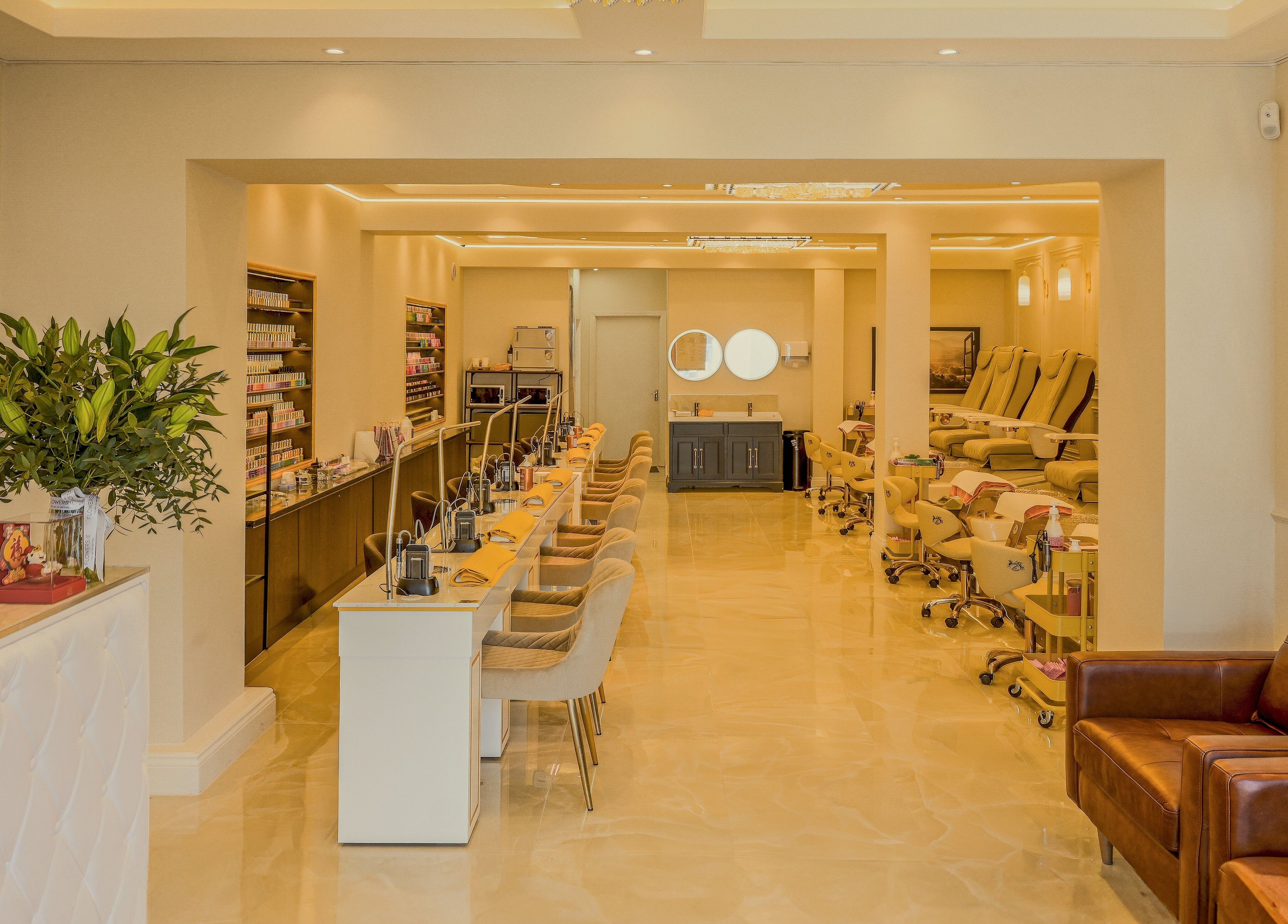 Modern and elegant interior of Dolce Nails Naas salon in Naas, IE, showcasing manicure stations and pedicure chairs.