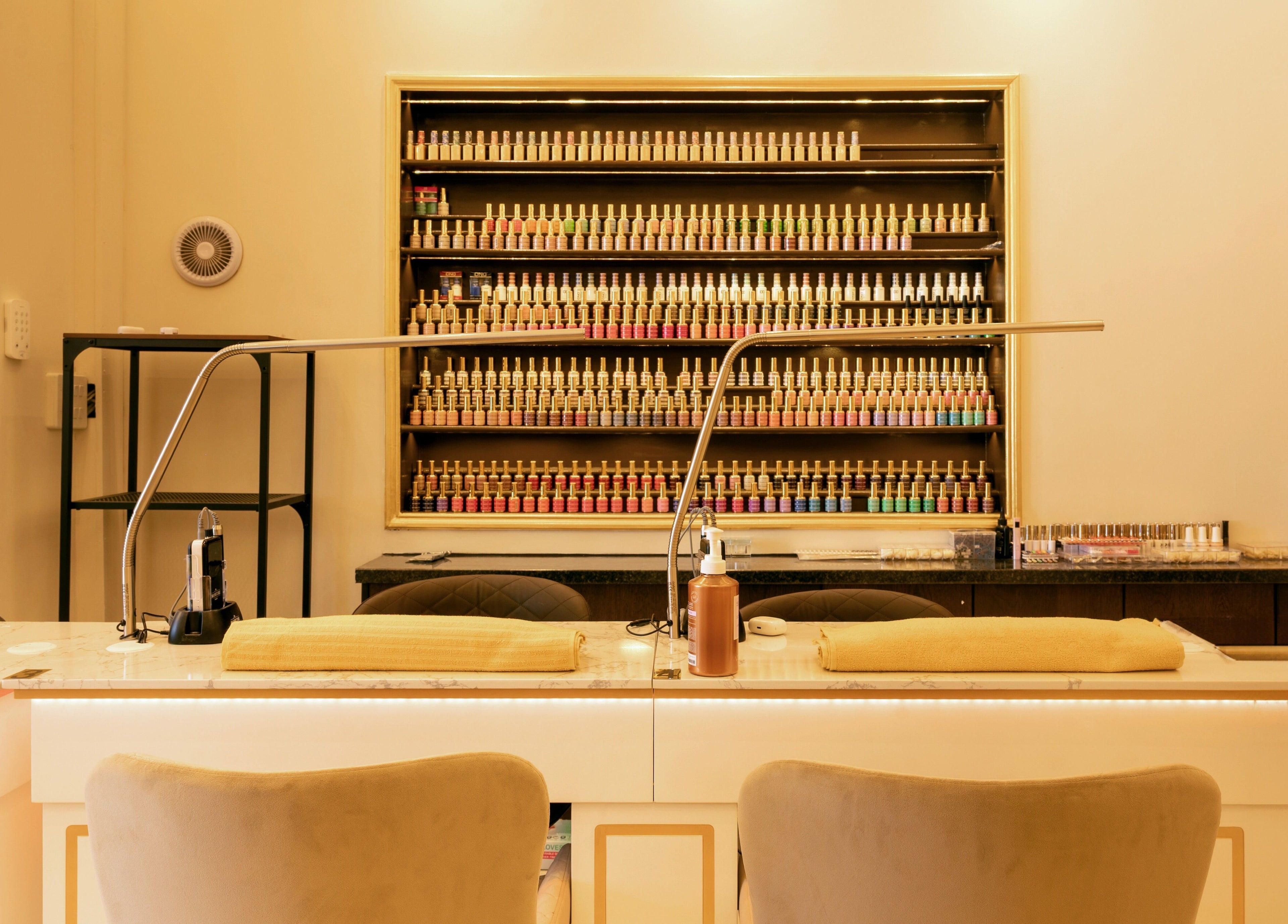 Nail polish display at Dolce Nails Naas, Naas, IE, showcasing vibrant colors and professional nail care.