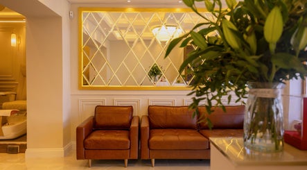 Elegant lounge area at Dolce Nails Carlow, Carlow, County Carlow, IE with leather seating and cozy decor.