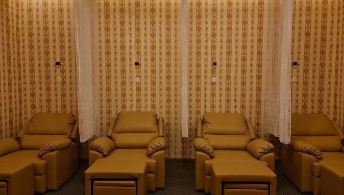 Luxurious seating at Onyx Family Relax Center, Kalimantan Barat, ID showcasing a serene and elegant ambiance.