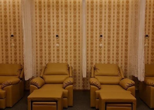 Luxurious seating at Onyx Family Relax Center, Kalimantan Barat, ID showcasing a serene and elegant ambiance.