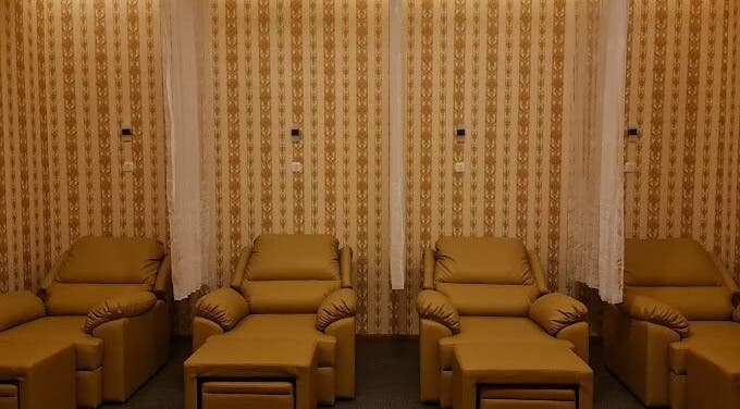 Luxurious seating at Onyx Family Relax Center, Kalimantan Barat, ID showcasing a serene and elegant ambiance.