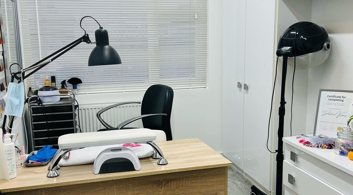 Professional nail salon setup at Didi Krasniqi, Wakefield, England, GB, featuring a desk and styling tools.