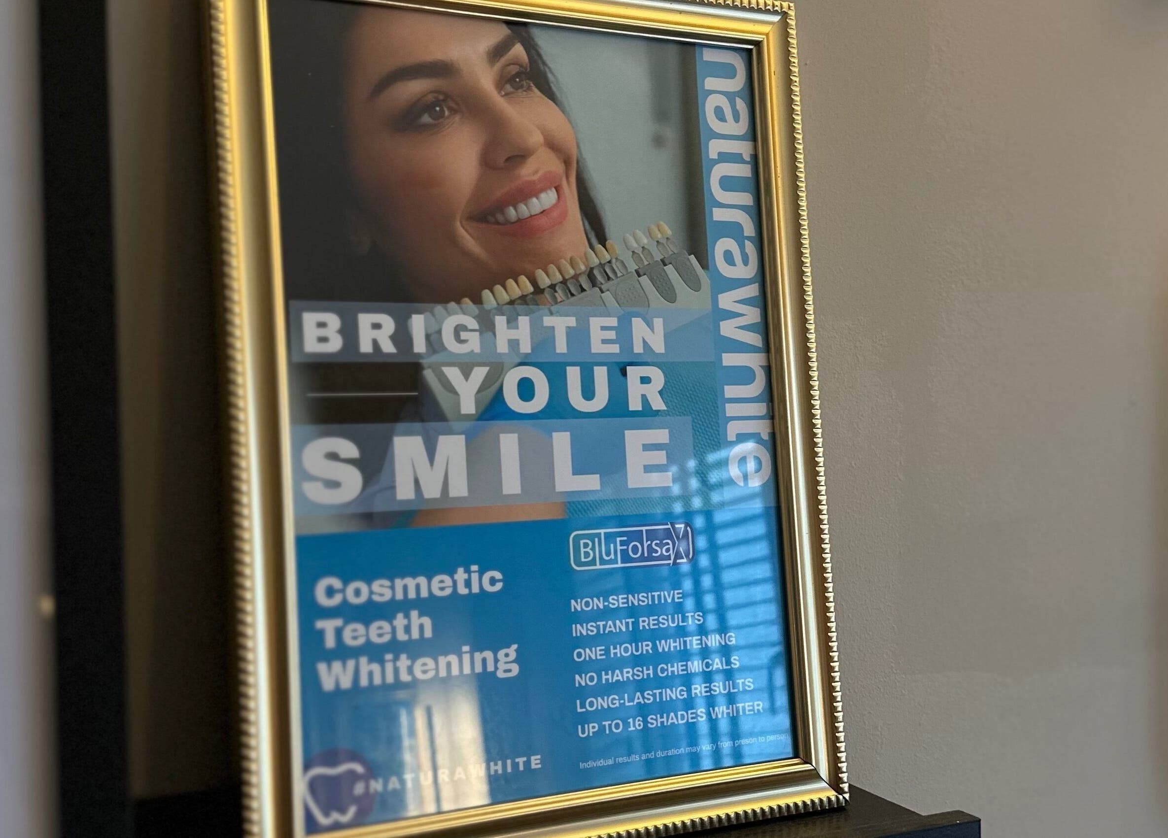 Teeth whitening service poster at The Pearly Bright, Blantyre, Scotland, GB offers instant results.