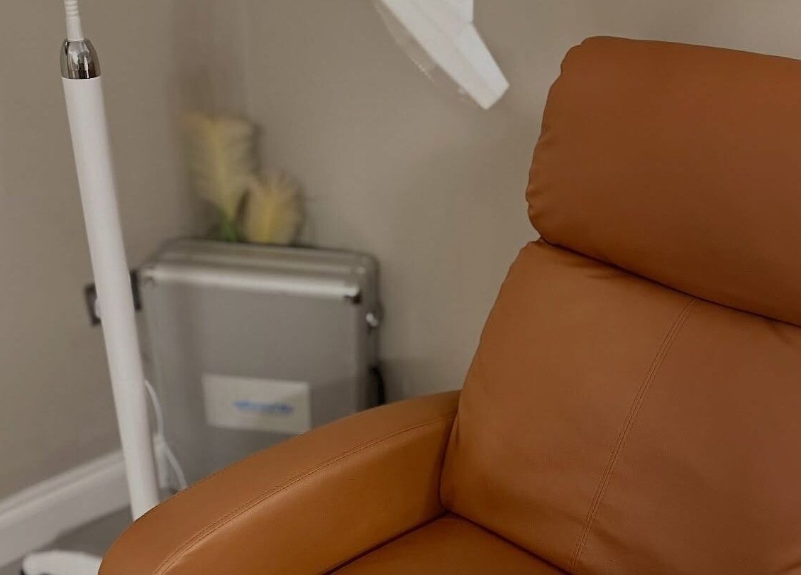 Comfortable brown leather chair at The Pearly Bright, Blantyre, Scotland, GB therapy room.
