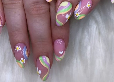 Colorful floral nail art at Beauty Box Studio, Jimboomba, Queensland, AU. Delicate flower designs and pastel swirls.