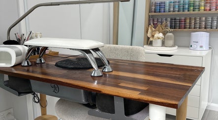 Elegant nail station at Beauty Box Studio, Jimboomba, Queensland, AU with organized supplies and sleek decor.