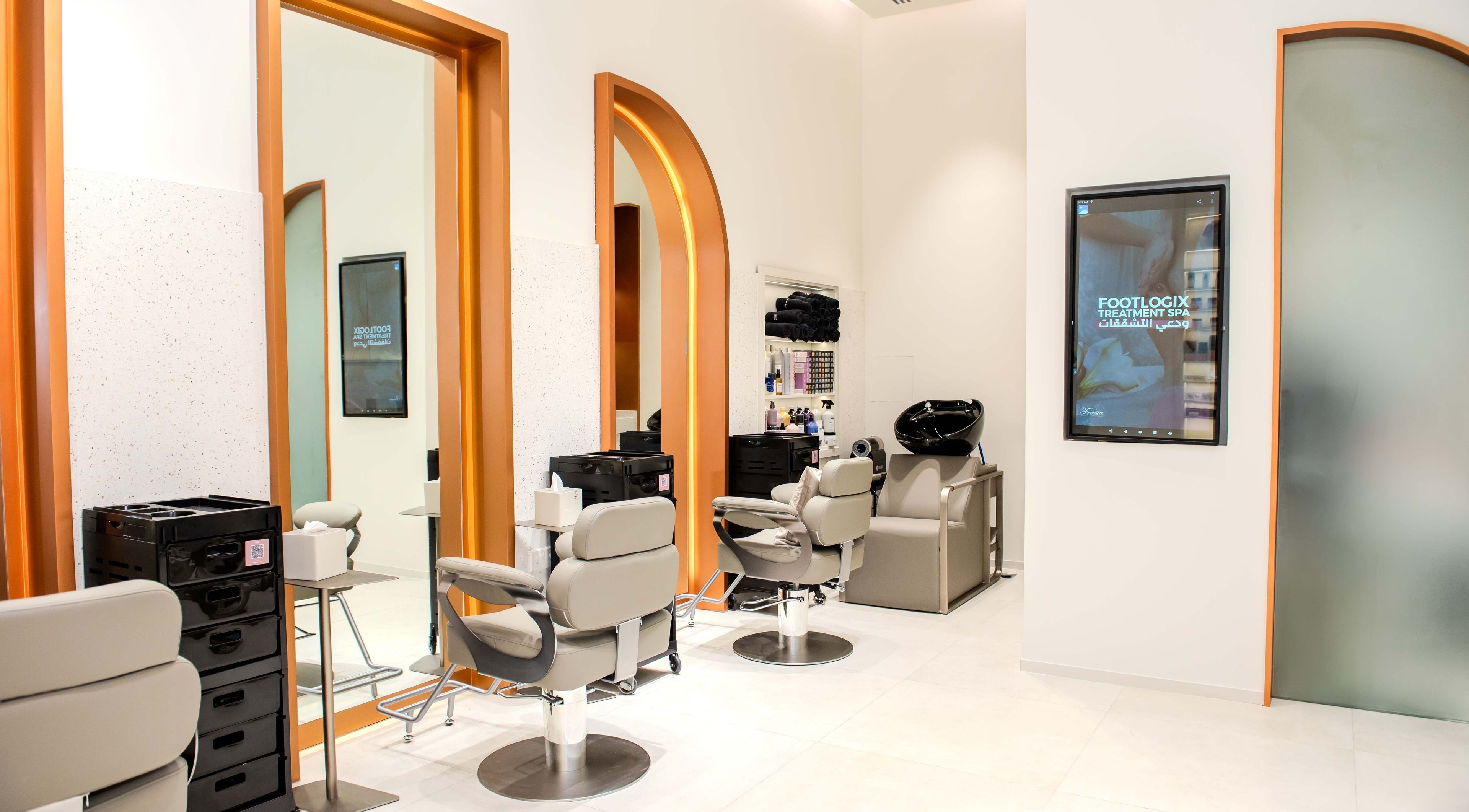 Freesia Beauty Center hair salon chairs at Shawamekh Central Mall, Abu Dhabi, AE.