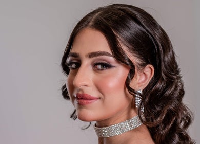 Sophisticated hairstyle at Freesia Beauty Center Shakhbout City, Abu Dhabi, AE, showcasing luxury services.