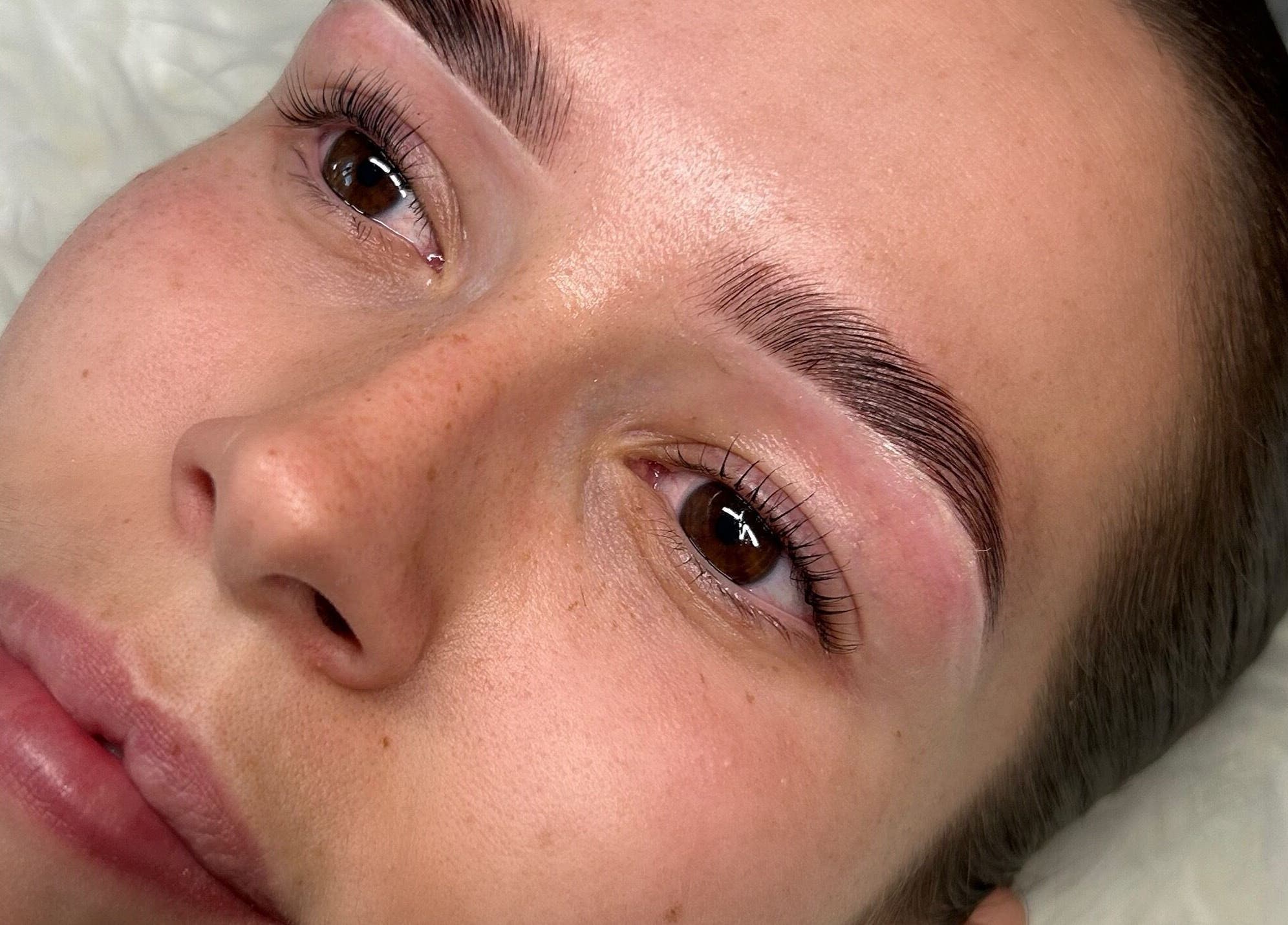 Close-up of perfectly groomed eyebrows at AJade Cosmetics, Birmingham, England, GB.