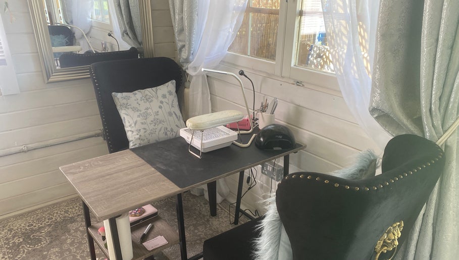 Chic nail care setup at The Beauty Bar in Drumoak, Scotland, GB with plush seating and elegant decor.