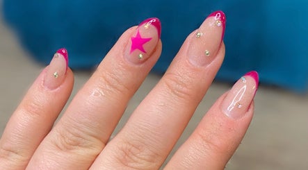 Pink and glitter star nail art at The Beauty Bar, Drumoak, Scotland, GB.