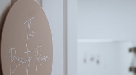 Elegant door sign of The Beauty Room Salon South, Mount Sheridan, Queensland, AU entrance.