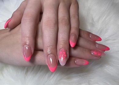 Stunning pink and floral nails at Foxie Nails Lounge, Pickerington, Ohio, US. Perfect for a chic style boost.