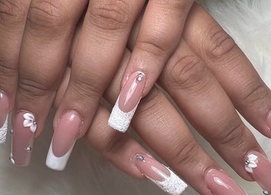 Elegant nail art with rhinestones at Foxie Nails Lounge in Pickerington, Ohio, US.