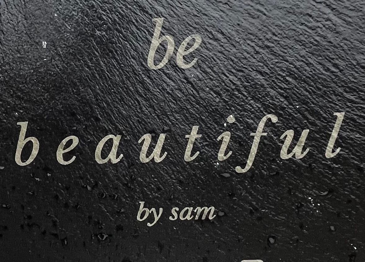 Be Beautiful By Sam x signage at Wolverhampton, England, GB showcasing sleek typography.