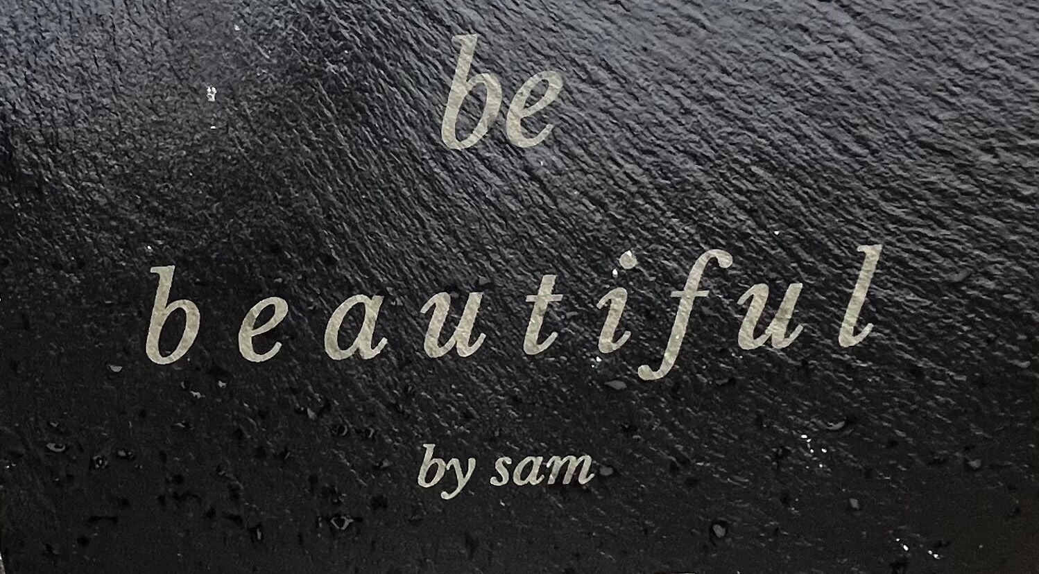 Be Beautiful By Sam x signage at Wolverhampton, England, GB showcasing sleek typography.