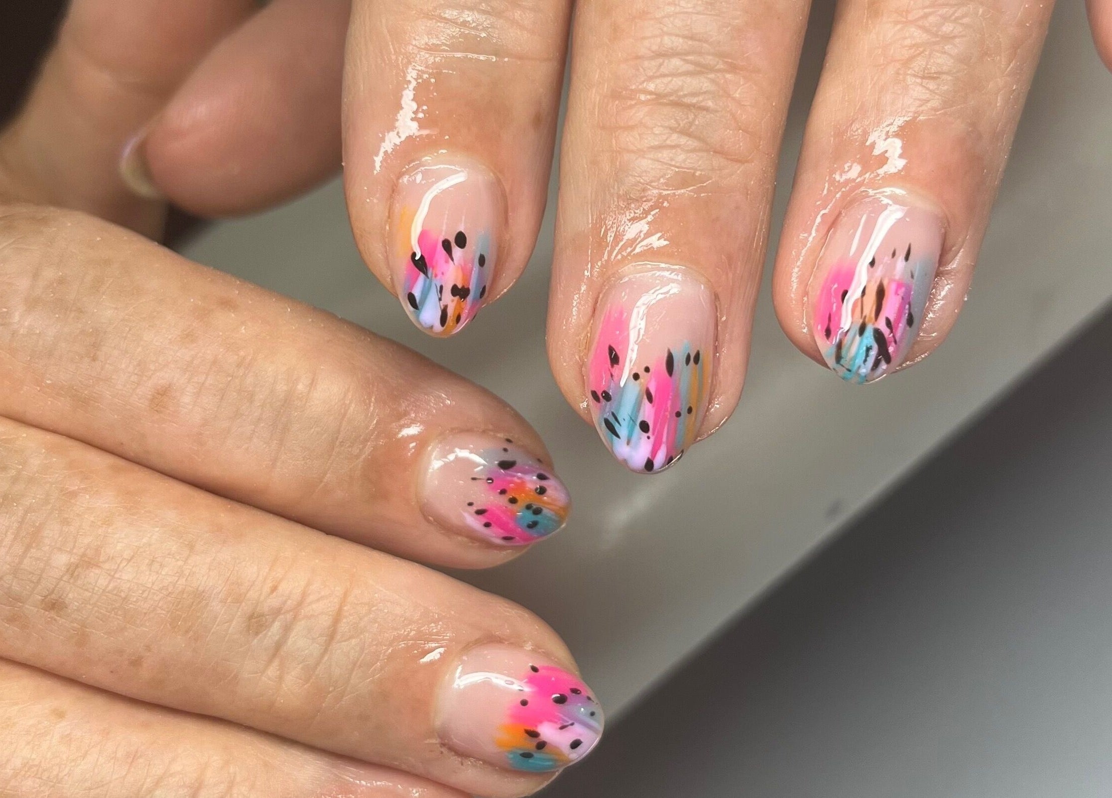 Colorful nail art at Be Beautiful By Sam x, Wolverhampton, England, GB showcases vibrant designs.