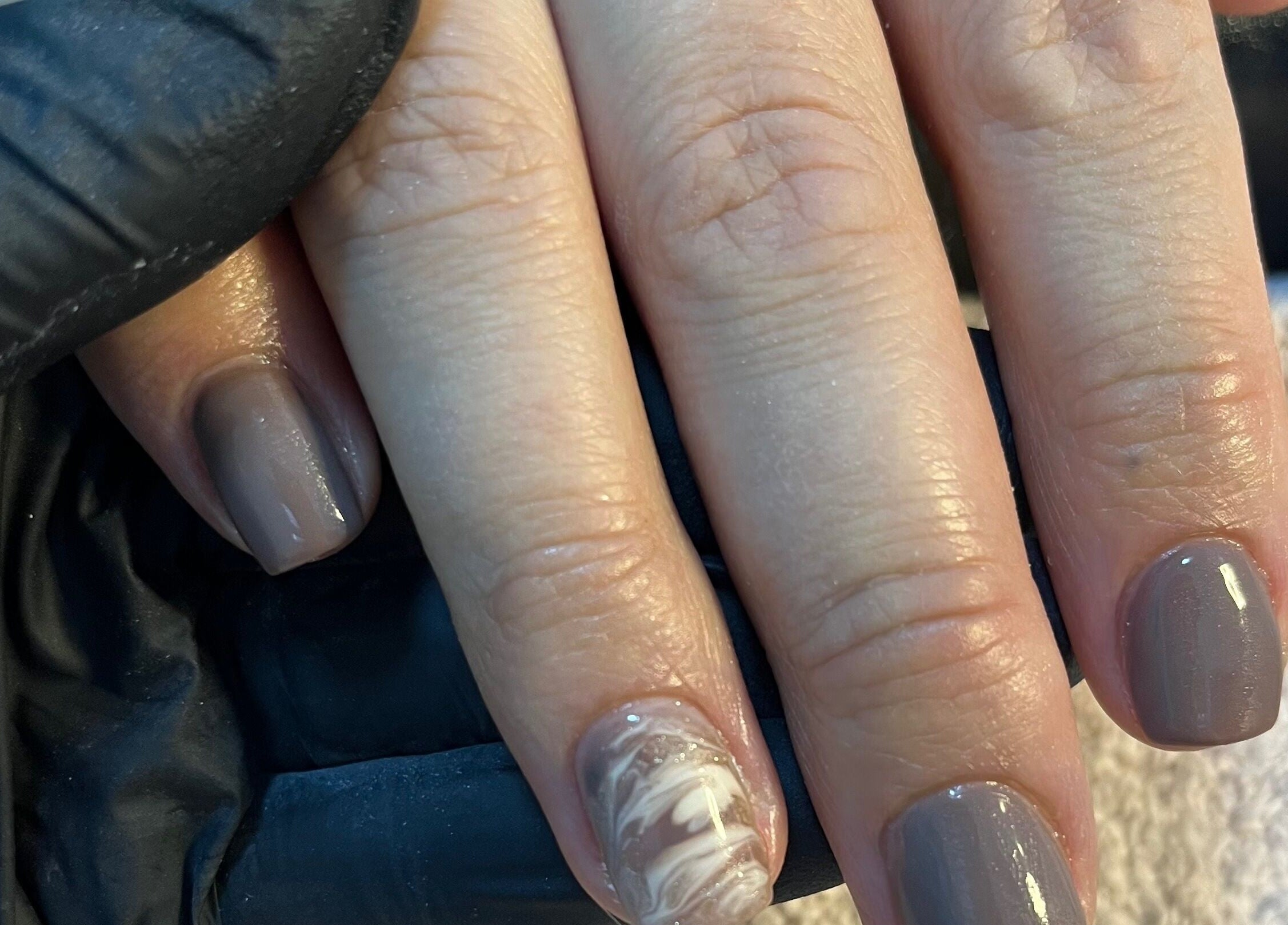 Stylish grey manicure with marble accent at Be Beautiful By Sam x, Wolverhampton, England, GB.