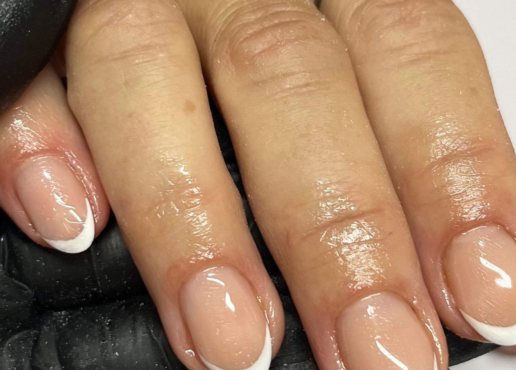 French manicure at Be Beautiful By Sam x, Wolverhampton, England, GB, showcasing glossy finish.