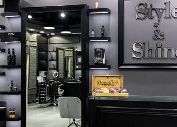 Stylish interior of Style and Shine Gents, Dubai, AE. Modern decor with shelves and grooming products.