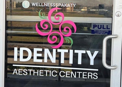 Entrance of KATY, TX - Identity Aesthetics with logo in Katy, Texas, US, welcoming visitors.