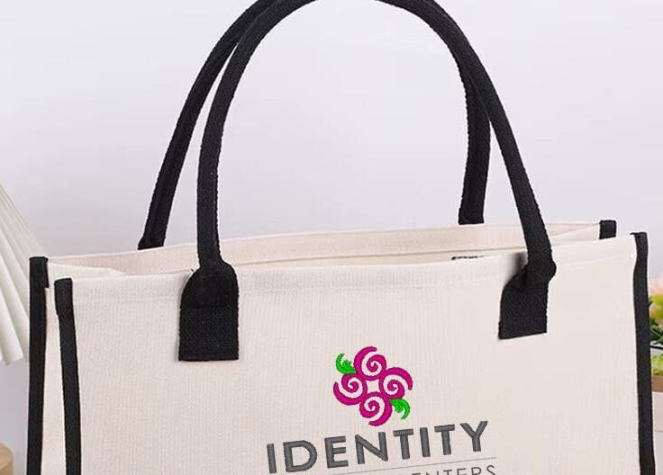 Chic tote bag from KATY, TX - Identity Aesthetics, Katy, Texas, US, with elegant black handles.