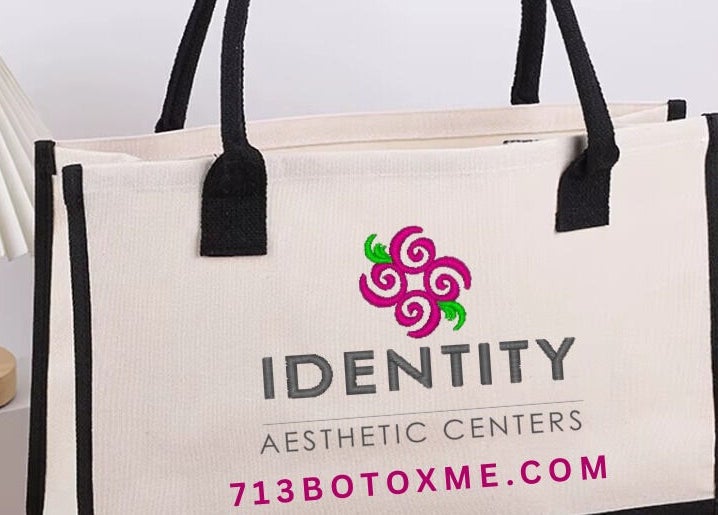 Stylish tote bag at CONROE, TX - Identity Aesthetics, Conroe, Texas, US, featuring logo and floral decor.