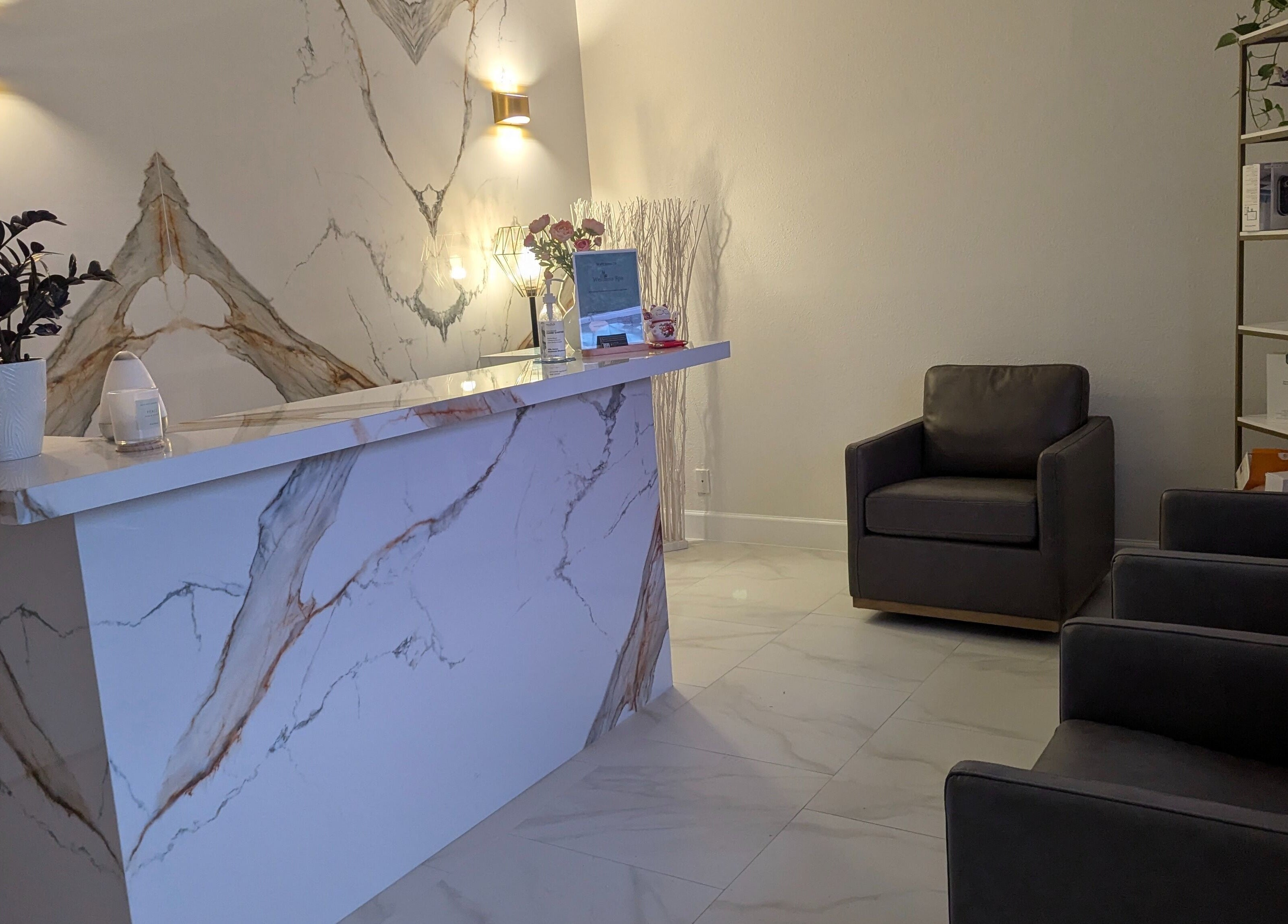 Reception of Identity Aesthetics in FULSHEAR, TX features marble decor and seating. Fulshear, Texas, US.