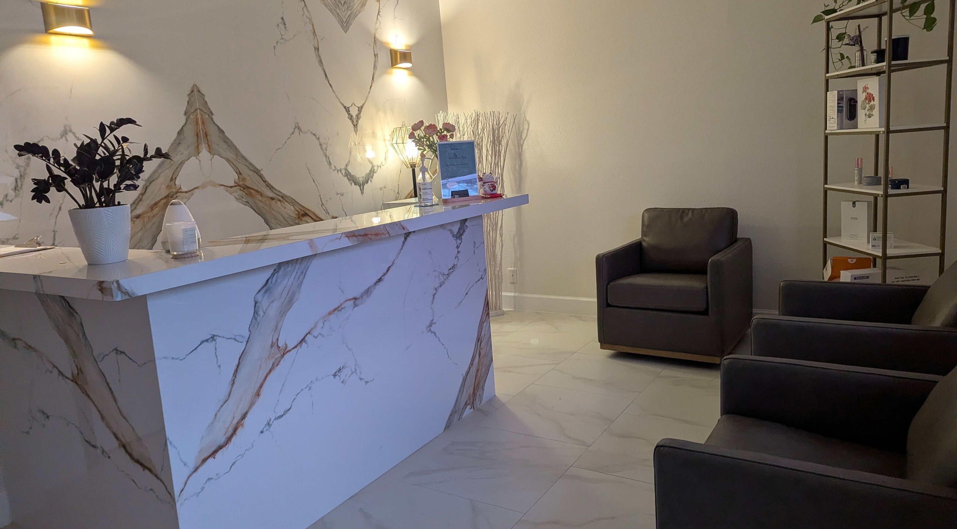 Reception of Identity Aesthetics in FULSHEAR, TX features marble decor and seating. Fulshear, Texas, US.