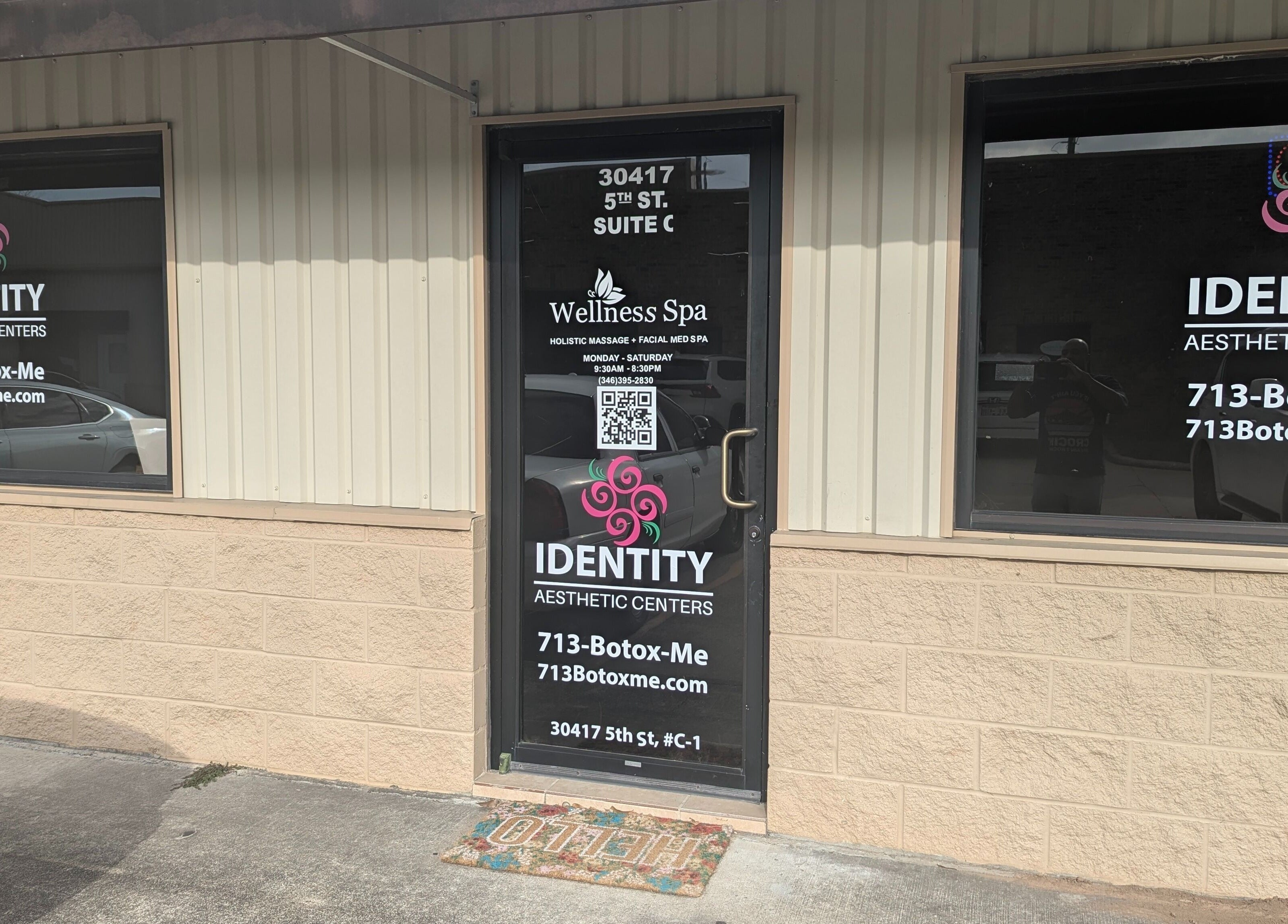 Entrance of FULSHEAR, TX - Identity Aesthetics, showcasing the door and signage in Fulshear, Texas, US.