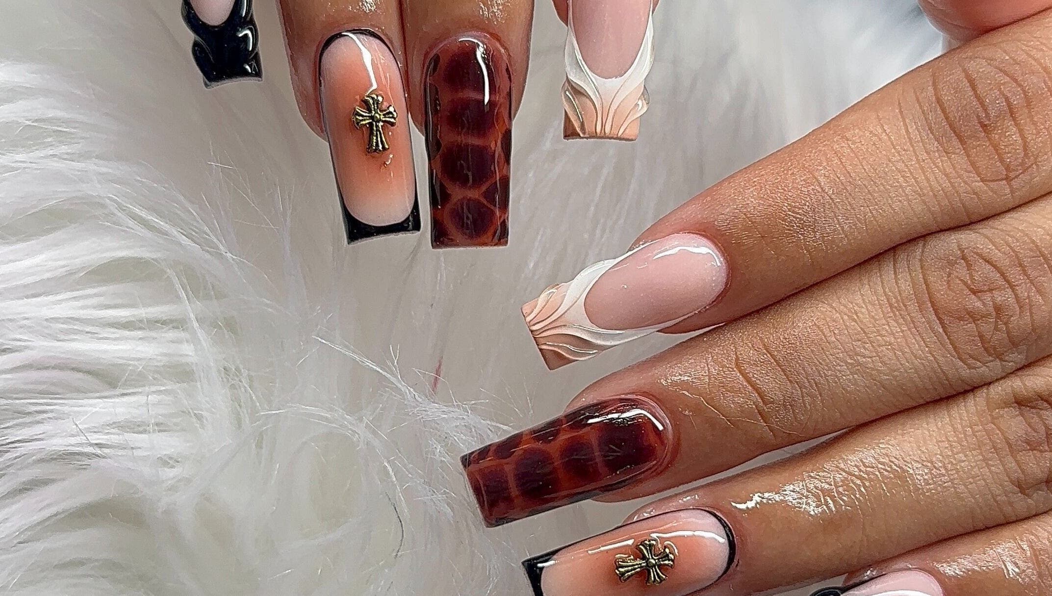 Elegant nail art design at Angel Nails & Head Spa in Denton, Texas, US showcasing detailed artistic nails.