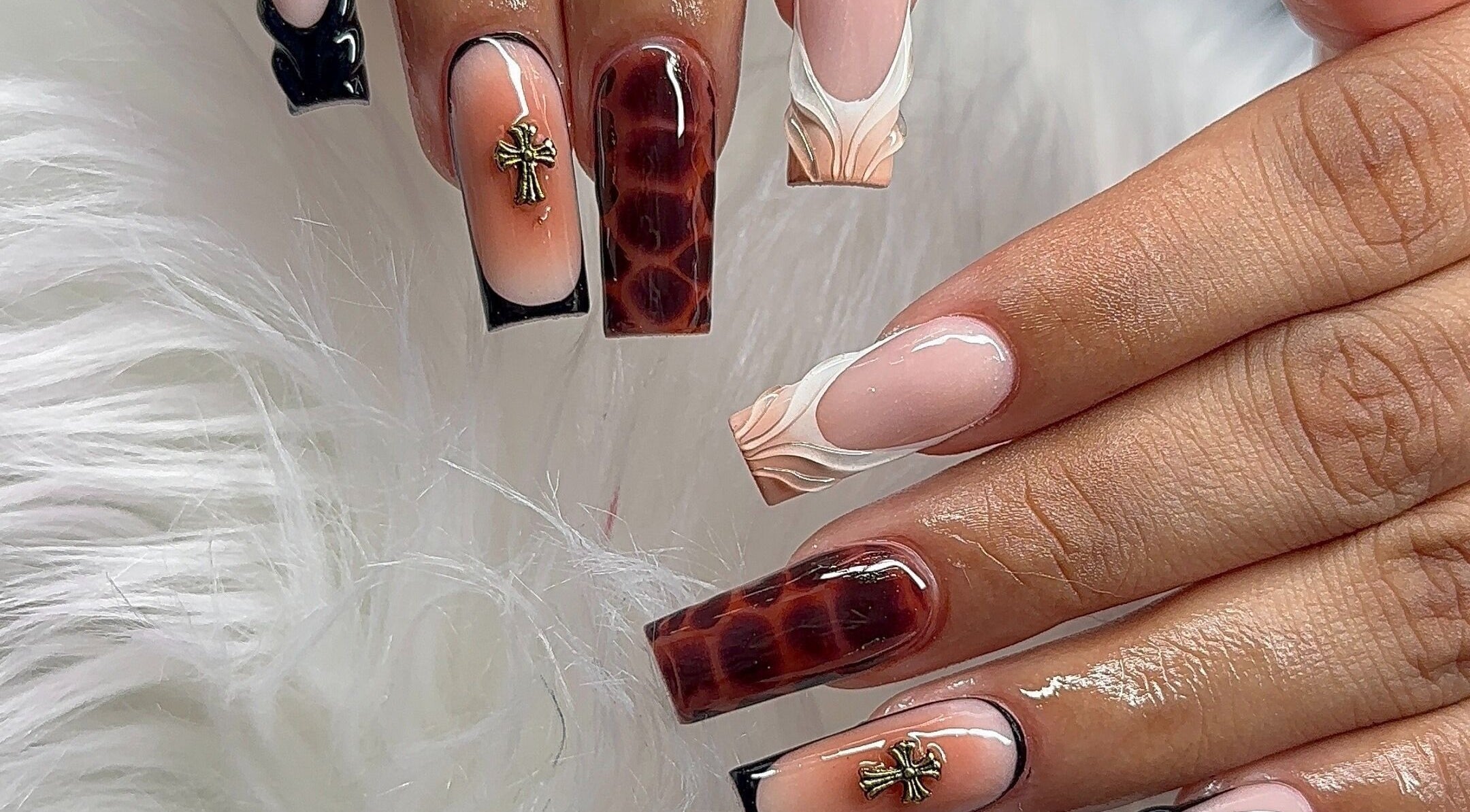 Elegant nail art design at Angel Nails & Head Spa in Denton, Texas, US showcasing detailed artistic nails.