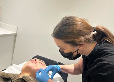 Beautician performing a treatment at Aesthetics and Wellness at Beauty at 22, Wakefield, Durkar, England, GB.