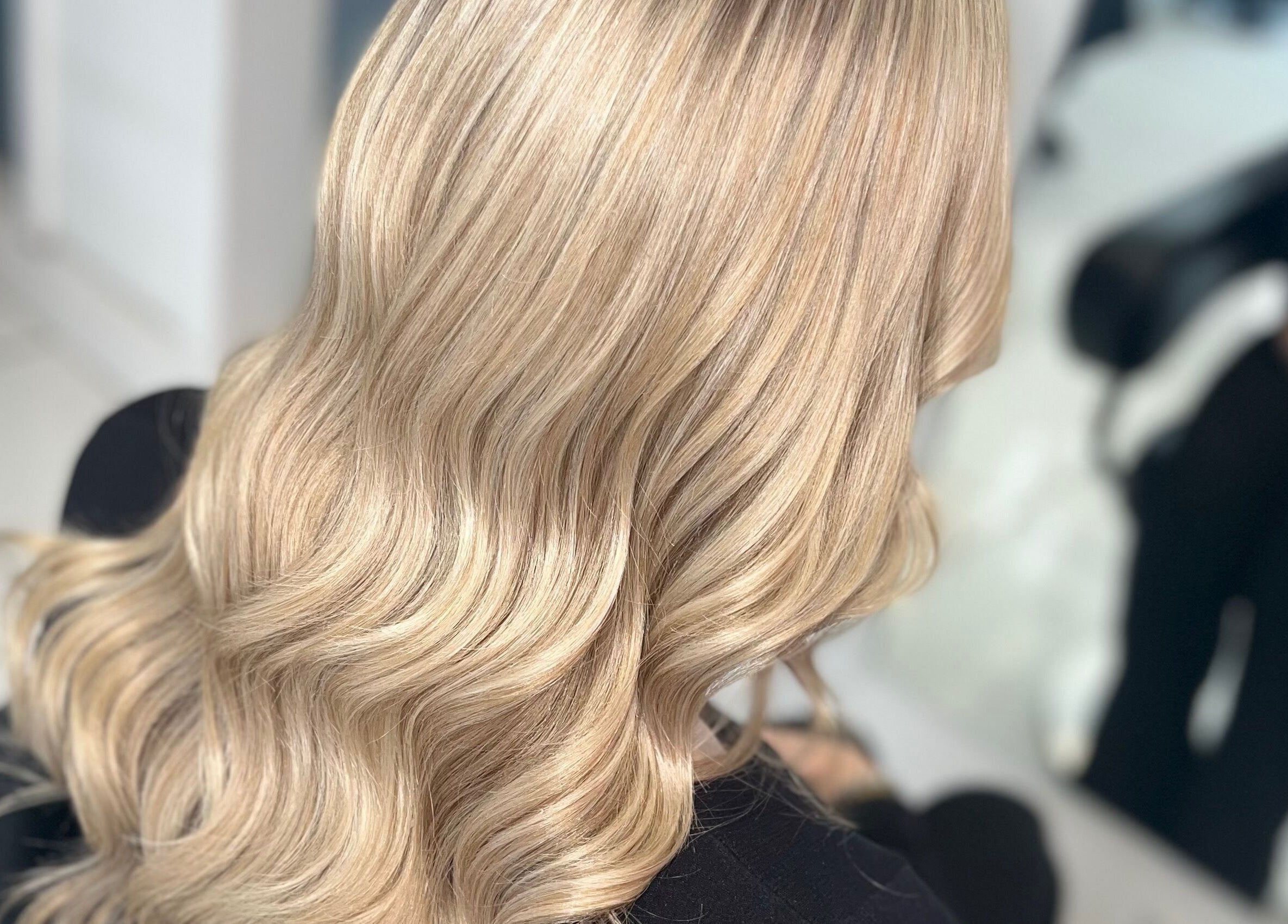 Styled blonde hair at KHD, Newtongrange, Scotland, GB showcased in a salon.