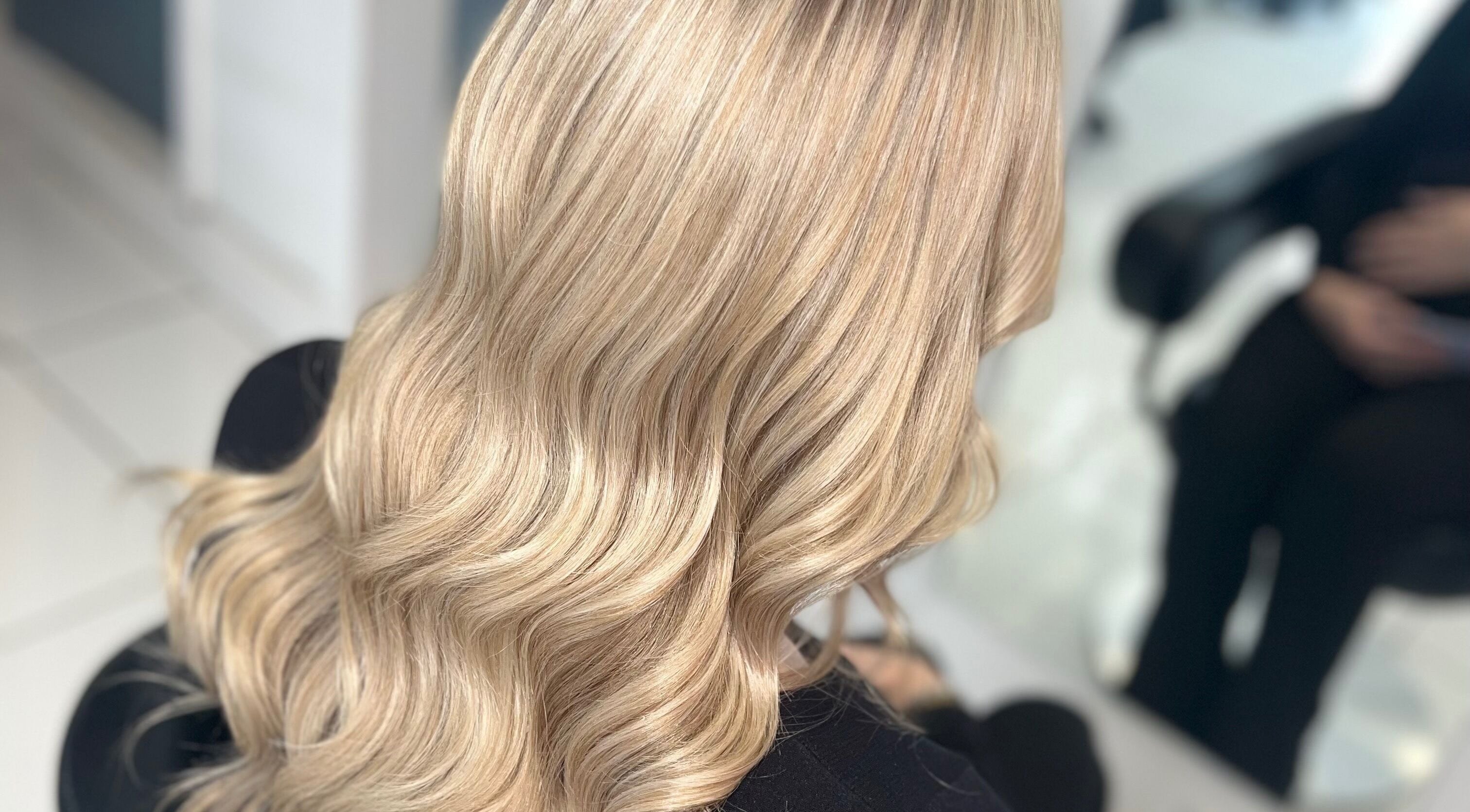 Styled blonde hair at KHD, Newtongrange, Scotland, GB showcased in a salon.