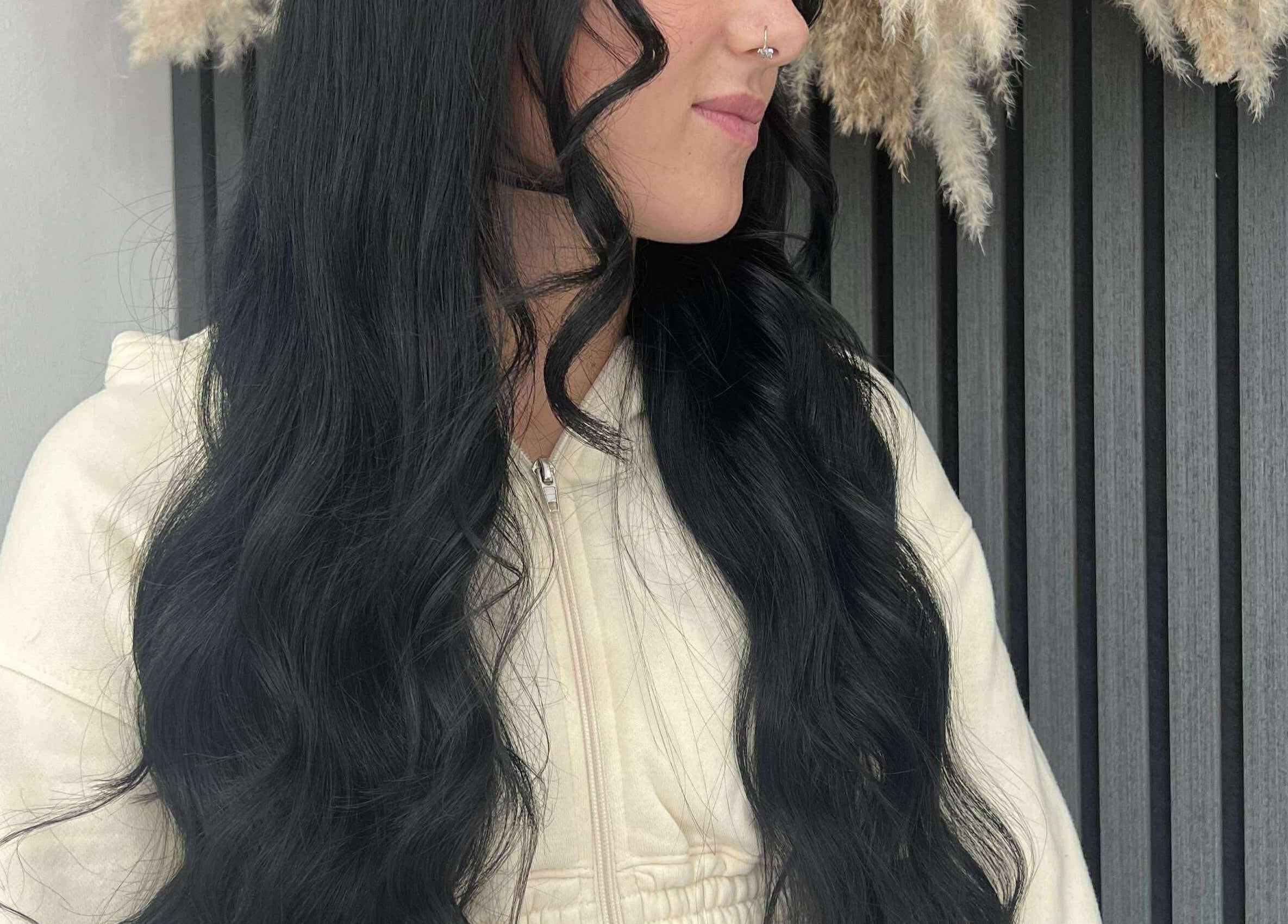 Elegant black waves hairstyle at KHD in Newtongrange, Scotland, GB, showing luxurious hair texture.