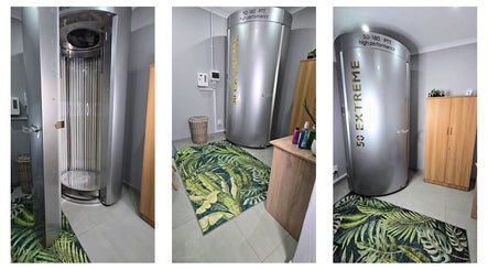 Modern tanning booth at The Glam Factor Beauty & TanCan, Krugersdorp, Gauteng, ZA with elegant decor.