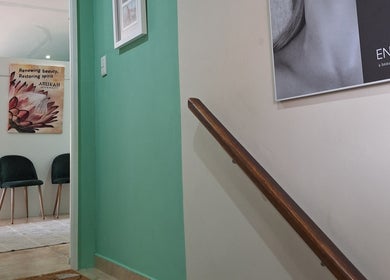 Welcoming entrance of Arukah Skin & Beauty in Paarl, Western Cape, ZA, featuring tasteful decor and seating.