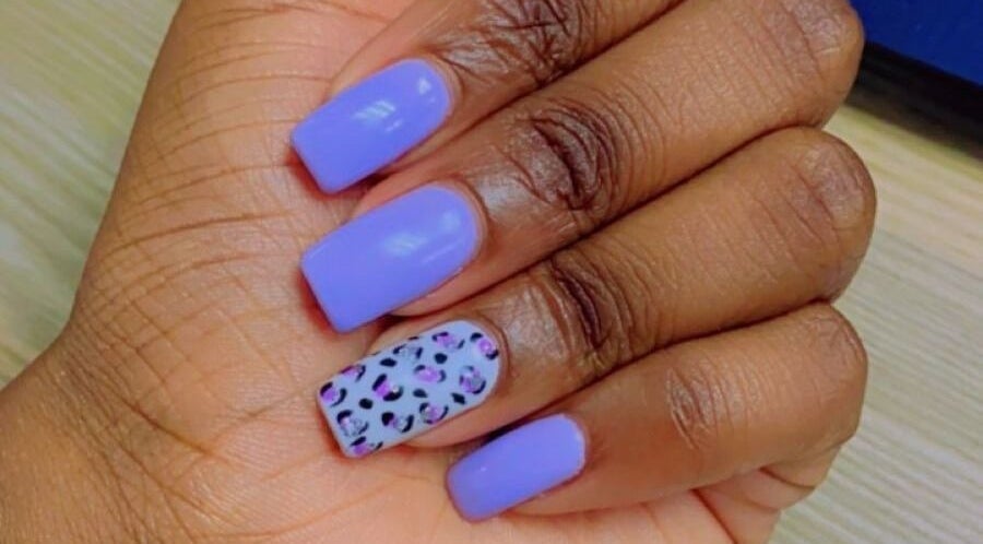 Vibrant lavender nails with leopard accent at Phenomenail by Pearl, Hillcrest, Kwazulu-natal, ZA.