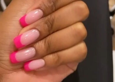 Stylish pink French manicure at Phenomenail by Pearl, Hillcrest, Kwazulu-Natal, ZA, showcasing elegant nail artistry.