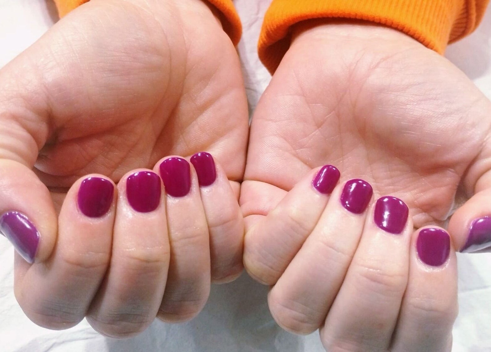 Stylish purple manicure from Glow Beauty Works in Dartford, England, GB showcasing elegance and care.