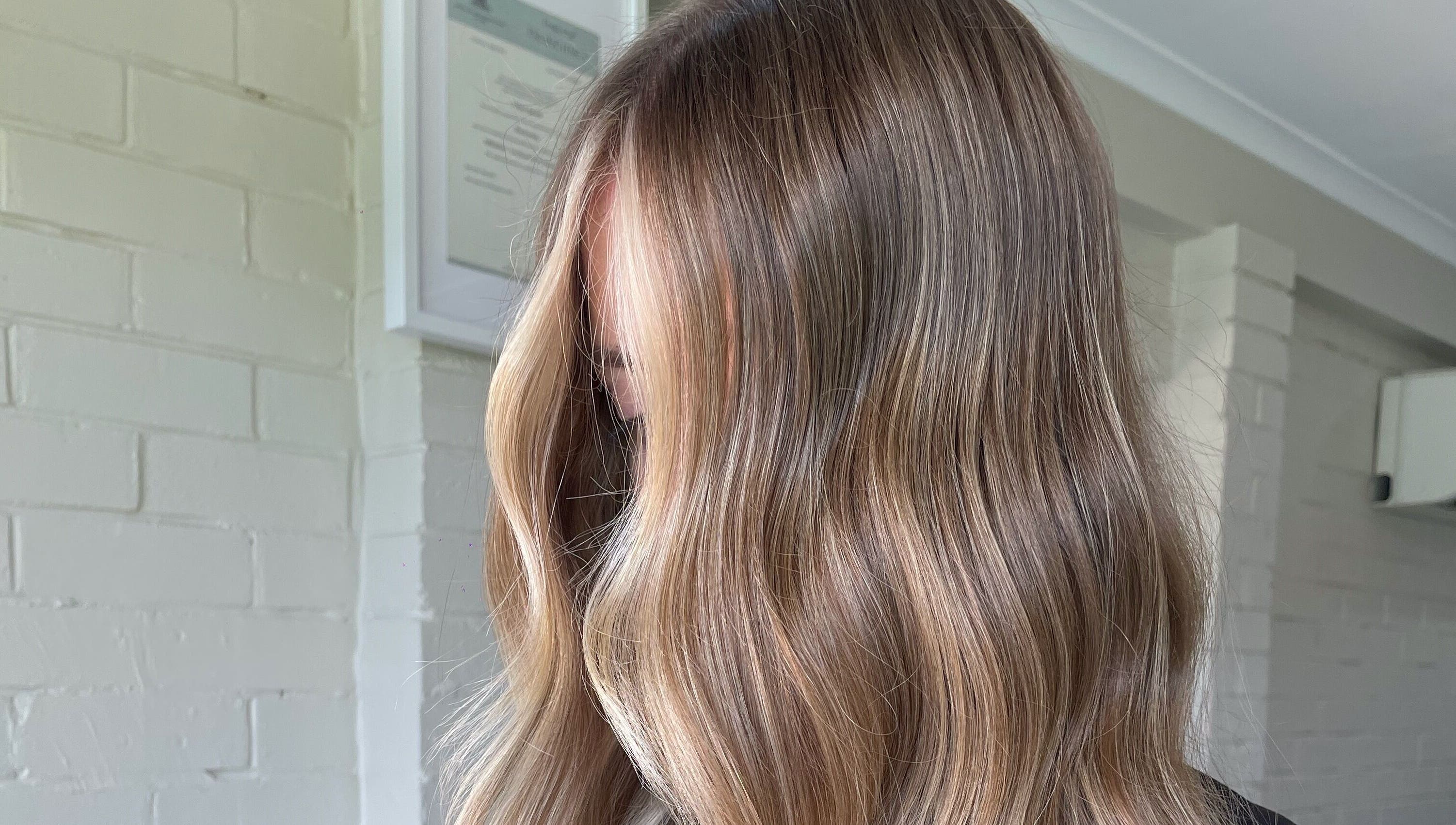 Smooth, wavy blonde hair treatment at Colour Haus by TJ, Wilton, New South Wales, AU.