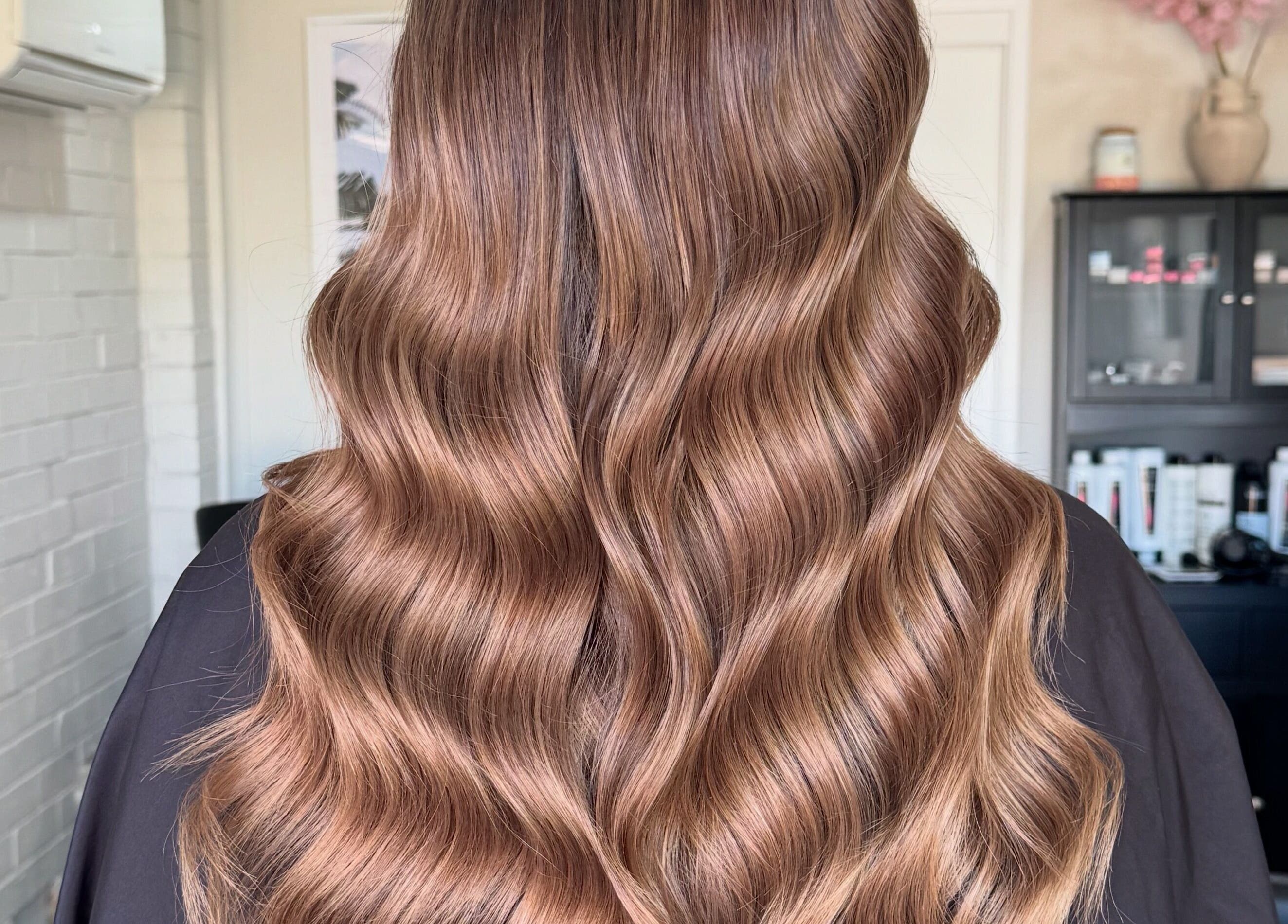 Gorgeous wavy hairstyle at Colour Haus by TJ, Wilton, New South Wales, AU, showcasing luxurious hair styling.
