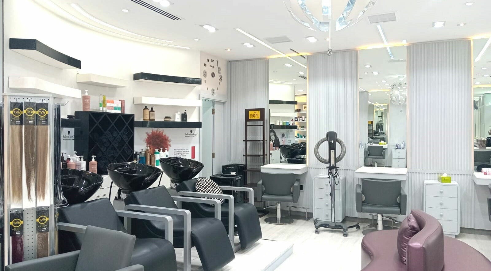 Modern salon interior at Tip Top Hair Beauty Salon | Marina Byblos Hotel, Dubai, Dubai, AE featuring sleek design.